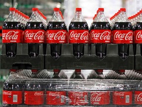 Bottles of Coca-Cola, which will be delivered to stores, are seen in a warehouse at the Swire Coca-Cola facility in Draper, Utah. (REUTERS/George Frey)