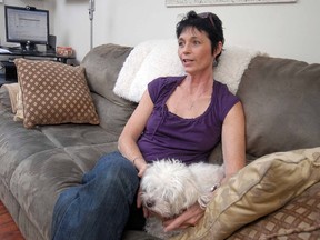 Susan Campbell of Stratford, Ont., shown with the family dog Sandy on Friday, Feb. 3, 2012, was declared deceased by the federal government recently. (SCOTT WISHART/ QMI AGENCY)