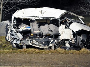 Ten migrant workers and a truck driver were killed and three people injured in a “horrific” two-vehicle crash near Stratford, Ont., on Monday. OPP said 10 people travelling in an extended van died, along with the driver of a tractor-trailer after the vehicles collided just before 5 p.m. at the intersection of Perth Rd. 107 and Line 47, north of Shakespeare, Ont. (DAVE RITCHIE/Special to the Toronto Sun)