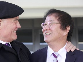 Pastor Jae-Kap Song, right, leaves Orangeville court Thursday with his lawyer, Christophe Preobrazenski, after being found not guilty in an alleged bizarre sex assault. (Tracy McLaughlin photo)