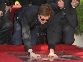 Paul McCartney Honored with a star on The Hollywood Walk Of Fame held In front of The Capitol Records Building. (WENN.COM)
