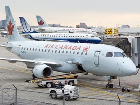 Planes sit on the tarmac at Pearson International Airport in Toronto in this Dec. 13, 2006 file photo. (QMI Agency files)
