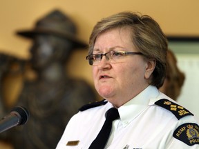 Assistant Commissioner Marianne Ryan speaks to the media on the arrest of Sawyer Robison at RCMP K Division in Edmonton , AB on Feb 10, 2012.  Robison was wanted on 2 charges of attempted murder in the shootings of Constable Sidney Gaudette and Constable Sheldon Shah at a residence near Killam, Alberta.(PERRY MAH/EDMONTON SUN)