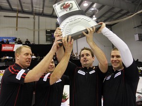 Team Stoughton (l-r) Steve Gould, Jon Mead, Reid Carruthers and skip Jeff Stoughton hoist the trophy after defeating Mike McEwen 5-4 in the Safeway Select final in Beausejour Sunday February 13, 2011. Neepawa will host the 2013 tournament (BRIAN DONOGH/Winnipeg Sun files)