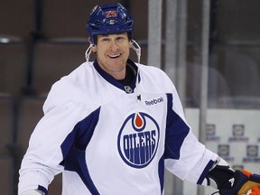 Andy Sutton, shown during a recent practice, will be back patroling the Oilers' blue-line Saturday in Ottawa after being a healthy scratch the last two games.