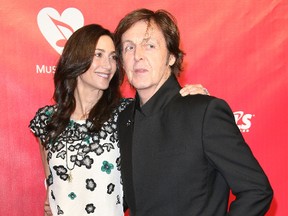 Sir Paul McCartney and wife Nancy Shevell arrive at 2012 MusiCares Person Of the Year Gala at the Los Angeles Convention Center, Feb. 10, 2012. (Adriana M. Barraza/WENN.COM)