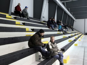 Fans watch the Winnipeg South Blues host the Neepawa Natives in MJHL action on Thursday. While demand for Winnipeg Jets hockey is booming, Manitoba's junior leagues are struggling to fill seats. (BRIAN DONOGH/Winnipeg Sun)