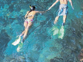 Snorkelling in Maui is a great way to rekindle romance. The Hawaiian islands host special getaway packages for those seeking to renew their vows during the season of Valentine. (QMI Agency files)