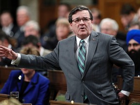 Canada's Finance Minister Jim Flaherty speaks during Question Period in the House of Commons on Parliament Hill in Ottawa February 6, 2012.    REUTERS/Blair Gable
