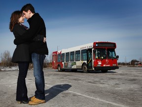 Alissa LaVecchia and Nigel Monahan pose for a photo at the Fallowfield bus station Monday.  The couple met on the 95 bus a year ago and have been together ever since.  Tony Caldwell/Ottawa Sun