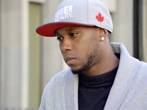 Leroy Smickle leaves University Ave. courthouse Monday, Feb. 13, 2012, after Superior Court Justice Anne Molloy ruled sentencing Smickle to the mandatory minimum of three years for a gun offence would constitute “cruel and unusual punishment.” Christopher Lewis plans to launch a challenge to the same law on Friday. (ALEX CONSIGLIO/Toronto Sun files)