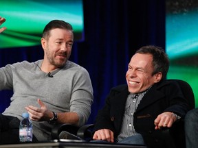 Cast members Ricky Gervais, left, and Warwick Davis attend the panel for the HBO television series "Life's Too Short" at the Television Critics Association winter press tour in Pasadena, California, Jan. 13, 2012.  (REUTERS/Mario Anzuoni)