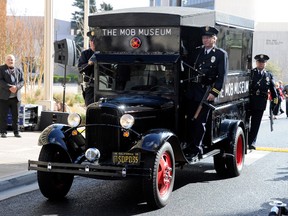 A 1938 Ford paddy wagon from the San Diego Police Historical Society and Museum arrives at the grand opening of The Mob Museum February 14, 2012 in Las Vegas, Nevada. Ethan Miller/Getty Images/AFP