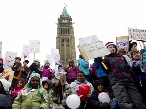 Children read letters to the Canadian government for a better world for First Nations children and all Canadians on Parliament Hill in Ottawa, February 14, 2012.  Chris Roussakis/QMI Agency