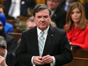 Minister of Finance Jim Flaherty speaks during Question Period in the House of Commons on Parliament Hill in Ottawa, Feb. 13, 2012. (REUTERS/Patrick Doyle)