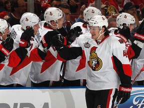 Jim O'Brien #42 of the Ottawa Senators is congratulated by teammates after scoring a first-period goal against the Florida Panthers on February 15, 2012 at the BankAtlantic Center in Sunrise, Florida.  Joel Auerbach/Getty Images/AFP