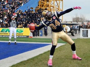 Greg Carr (celebrating a touchdown at Canad Inns Stadium last season) reached an agreement in principle to return to the Bombers Wednesday, but later chose to take more money from the Edmonton Eskimos. (FRED GREENSLADE/REUTERS Files)