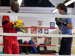 Justin Trudeau with his boxing trainer Ali Nestor Charles.  (QMI Agency/ÉMILIE DUBREUIL)