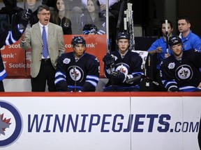 Winnipeg Jets head coach Claude Noel (behind the bench during Winnipeg's 4-3 win over Tampa Bay Lightning on Feb. 23, 2012 at the MTS Centre in Winnipeg) isn't shy about saying that Thursday's home game against the Southeast Division-leading Florida Panthers is shaping up as one of the biggest games of the season. (FRED GREENSLADE/REUTERS Files)