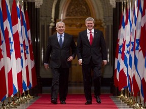 Prime Minister Stephen Harper and Benjamin Netanyahu, Prime Minister of Israel, walk down the Hall of Honour in Parliament Hill in Ottawa, March 2, 2012. Chris Roussakis/QMI Agency