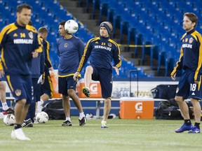 David Beckham practices with his L.A. Galaxy teammates on the artificial turf at Toronto's Rogers Centre on Tuesday. The Galaxy play Toronto FC Wednesday night. (ERNEST DOROSZUK/Toronto Sun)