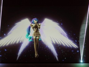 Computer-generated pop star Hatsune Miku is projected on a screen during her concert in Tokyo in this handout picture taken March 8, 2012. (REUTERS/SEGA/CRYPTON FUTURE MEDIA HANDOUT)