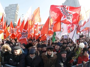 Protesters take part in a demonstration for fair elections on Novy Arbat Street in central Moscow March 10, 2012. (REUTERS/Sergei Karpukhin)