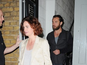 Ruth Wilson and Jude Law are seen leaving The Donmar Warehouse Theatre in London, England, August 15, 2011. (WENN.COM)