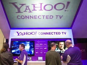 The Yahoo! Connected TV booth is shown during the 2011 International Consumer Electronics Show (CES) in Las Vegas, Nevada in this file photo taken January 7, 2011.  Yahoo Inc sued Facebook Inc on Monday over 10 patents that include methods and systems for advertising on the Web, according to a copy of the lawsuit. (REUTERS/Steve Marcus/Files)