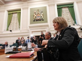 Canada's former integrity commissioner Christiane Ouimet prepares to testify before the Commons public accounts committee on Parliament Hill in Ottawa March 10, 2011. (REUTERS/Chris Watti)