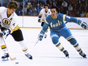 Dave (the Wrecker) Hrechkosy (right) fights for the puck with Bruins Bobby Orr, with Phil Esposito in the background. Hrechkosydied March 7, 2012, from complications of glioblastoma multiforme brain cancer diagnosed August 3, 2011. He signed his first NHL contract with the New York Rangers in 1972 at the age of 21. He went on to play five years in the NHL, for the St. Louis Blues, California Golden Seals, and in the minors with the New Haven Nighthawks, and Salt Lake Golden Eagles.