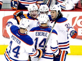 Chatham's Ryan Jones celebrates a goal with his Edmonton Oilers teammates. (MATT SULLIVAN/Reuters Photo)