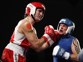 Liberal MP Justin Trudeau (L) and Conservative Senator Patrick Brazeau fight during their charity boxing match in Ottawa March 31, 2012. REUTERS/Chris Wattie