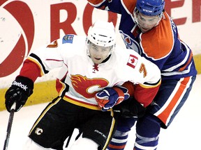 Defenceman T.J. Brodie will start the NHL season with the Calgary Flames. (JEFF BASSETT/QMI Agency)