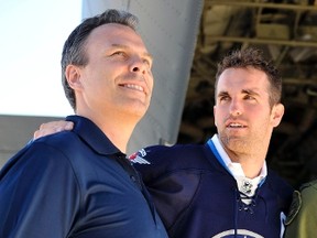 Winnipeg Jets GM Kevin Cheveldayoff (left) and captain Andrew Ladd. (REUTERS)