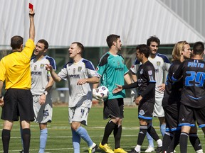 Minnesota Stars FC defender Kyle Altman disputes being ejected on a red card during a game against FC Edmonton at Clark Field on Sunday. The Stars beat the Eddies 4-3.
Ian Kucerak, Edmonton Sun