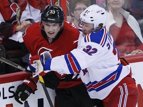 The Senators are putting a lot of faith in rookie Jakob Silfverberg, pictured battling with New York Rangers' Anton Stralman during the playoffs last season at Scotiabank Place in Ottawa (ERROL MCGIHON/THE OTTAWA SUN/QMI AGENCY).