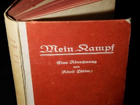 A signed copy of a first edition of Adolf Hitler's book Mein Kampf on display at Bloomsbury Auction House. (AFP PHOTO/CARL DE SOUZA)