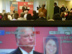 United Way head Rick Gibbons is shown on a video screen (foreground) as he delivers the 2012 funding announcement of the Ottawa United Way. The agency will spend $27 million on charitable programs in the region. (TONY SPEARS Ottawa Sun)