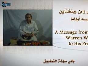 In this picture released by the SITE Intelligence Group on May 6, 2012 and taken off the video, al-Qaida's media arm, A-Sahab shows U.S. captive Warren Weinstein telling U.S. President Barack Obama to answer al-Qaida's demands or he will be killed. (AFP PHOTO/SITE Intelligence Group)