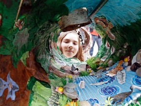 Grade 3 Students from The Grove Community Alternative school with a papier mache pipeline. (MICHAEL PEAKE/QMI AGENCY)