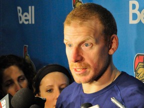 Daniel Alfredsson talks to media after cleaning out his locker at the Scotiabank Place in Ottawa on Saturday, April 28, 2012. Now with the Detroit Red Wings, Daniel Alfredsson was spotted back in Ottawa on Tuesday, Aug. 6, 2013. (MATTHEW USHERWOOD/Ottawa Sun)