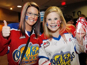 Oil Kings fans cheer on the team at Rexall Place on Sunday.