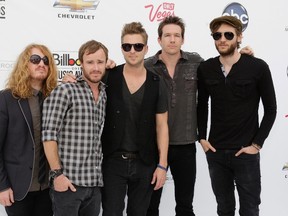 OneRepublic drummer Eddie Fisher, second from left, pictured with bandmates. (REUTERS/Steve Marcus)