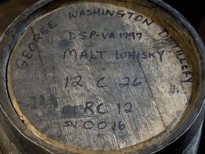 A 12-gallon  barrel filled with barley-based single-malt whiskey is pictured on March 25, 2012 in Mount Vernon, Virginia. A notorious Belfast prison that held Irish Republican Army inmates during the worst of the city's sectarian strife is to be transformed into a Whiskey distillery like this one.  AFP PHOTO/PAUL J. RICHARDS