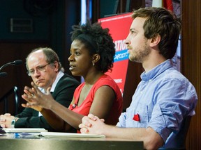 Canadian Federation of Students - Ontario chairperson, Sandy Hudson (centre) speaks to the media at Queen's Park Friday. To the left is Ontario Public Service Employees Union, Benoit Dupuis and the right York University student Xavier Lafrance (Ernest Doroszuk /TORONTO SUN/QMI AGENCY).