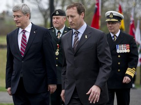 Prime Minister Stephen Harper, left and Defence Minister Peter MacKay attend the unveiling of the Royal Canadian Naval Monument in Ottawa, May 3, 2012. (Chris Roussakis/QMI Agency)