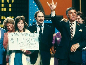 Actor and television game show host Richard Dawson (R) is seen in this undated handout photo supplied by the Game Show Network (GSN) on June 3, 2012. Best known for his work on the game show "Family Feud" and sitcom "Hogan's Heroes", Dawson died from complications of esophageal cancer on June 2, 2012, at the age of 79. (REUTERS/GSN/Handout)