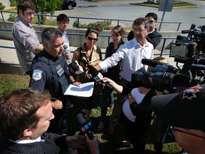 Gatineau Police Constable Pierre Lanthier talks to the media  Wednesday June 6, 2012. Gatineau police are looking for help finding evidence regarding the Shakti Ramsurrun triple homicide last month. Tony Caldwell/Ottawa Sun/QMI Agency