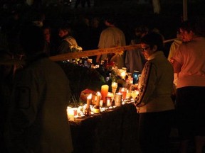 Onlookers held a candlelight vigil as rescue efforts continued after the Algo Centre Mall in Elliot Lake collapsed in June 2012.
Sudbury Star file photo